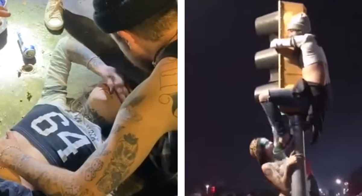 Joven le cae semáforo tras subirse a él, video se hace virale